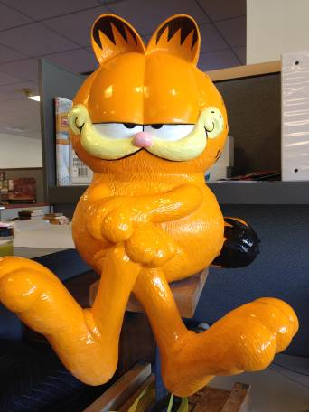 A statue of Garfield, the famous cat created by Indiana cartoonist Jim Davis, will sit on a bench at the entrance to the Indiana Young Readers Center to greet visitors and provide the perfect photo opportunity when visiting the State Library!